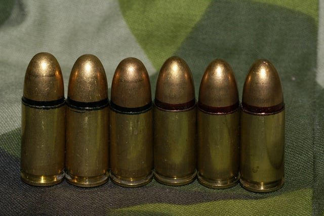 9mm live ammunition m/39 (left, with black seal) and m/39B (right, with red seal and a slightly more pointed shape)